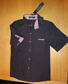 Black shirt brand new with red check detail short sleeve size M