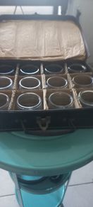 vintage set of 12 jars in lovely leather carry case