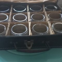 vintage set of 12 jars in lovely leather carry case