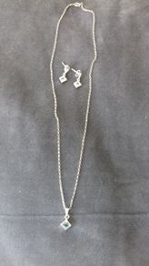 Pendant and earrings