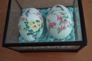 Two oriental hand painted eggs