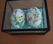 Two oriental hand painted eggs