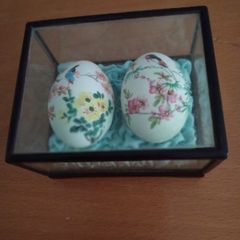 Two oriental hand painted eggs