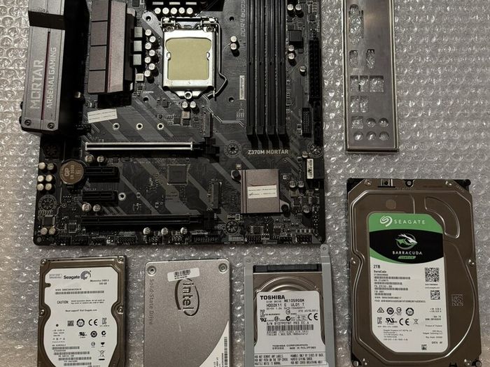 Motherboard and hard drives - FAULTY