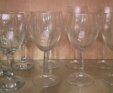 Eight wine glasses & wine carafe