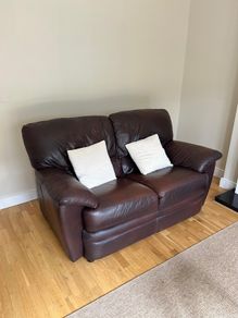 Leather sofa and two reclaiming arm chairs
