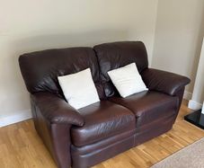 Leather sofa and two reclaiming arm chairs