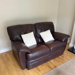 Leather sofa and two reclaiming arm chairs
