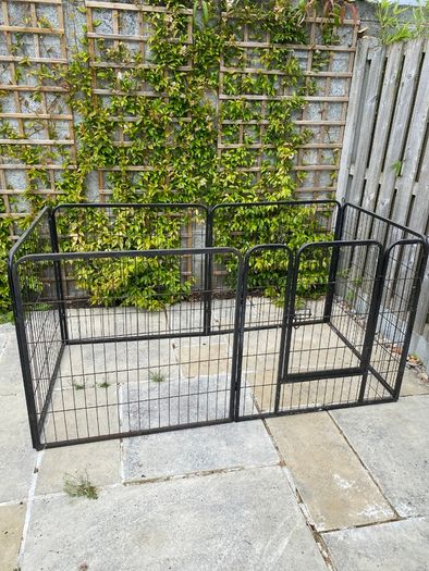 Black metal dog pen