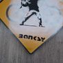 Banksy Sheet Metal Reproduction Road Sign of The Flower Bomber Image 4