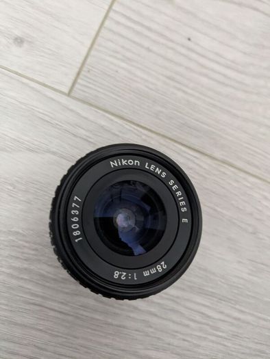 Nikon Series E 28mm f/2.8 manual focus wide-angle prime lenses.