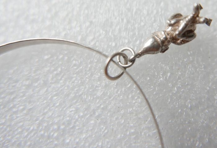 Vintage 925 Sterling Silver bangle with charm