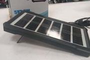 small portable solar panel with leads for charging your phone (Brand New)