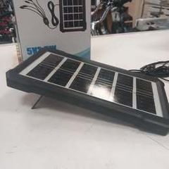 small portable solar panel with leads for charging your phone (Brand New)