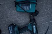 Makita 18V LXT Combi Drill paired with a Makita BL1830 3.0Ah Battery and the DC18RC LXT Fast Charger.