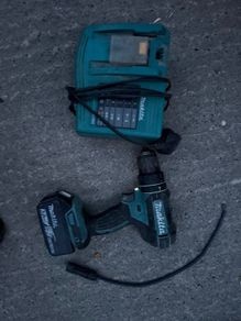 Makita 18V LXT Combi Drill paired with a Makita BL1830 3.0Ah Battery and the DC18RC LXT Fast Charger.