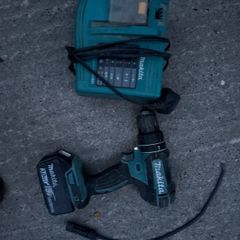 Makita 18V LXT Combi Drill paired with a Makita BL1830 3.0Ah Battery and the DC18RC LXT Fast Charger.