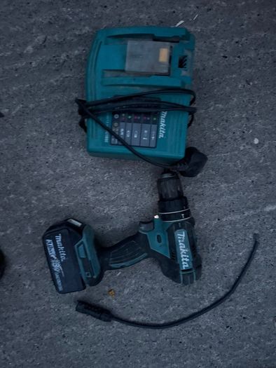 Makita 18V LXT Combi Drill paired with a Makita BL1830 3.0Ah Battery and the DC18RC LXT Fast Charger.