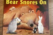 Book Bear snores on