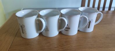 4 large Christmas mugs