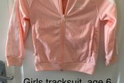 Girls adidas tracksuit, age 6 to 7
