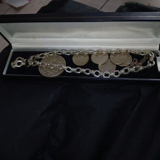 Silver Link Chain and some coins.