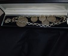 Silver Link Chain and some coins.