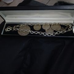 Silver Link Chain and some coins.