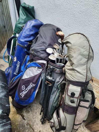 five golf bags and sixty nine clubs . ONE LOT ONLE.