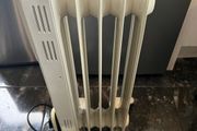 Neat oil heater