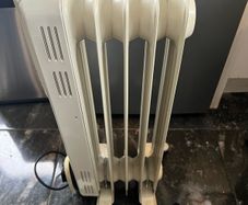 Neat oil heater