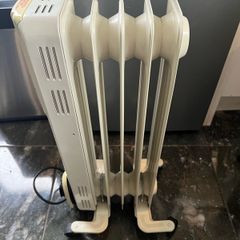 Neat oil heater