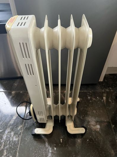 Neat oil heater