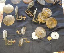 17 Old Pulley Wheels and 5 Plates, alot are brass