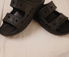 Black Crocs slip ons. Size 7