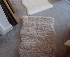 2 small rugs- ikea- sheepskin imitations