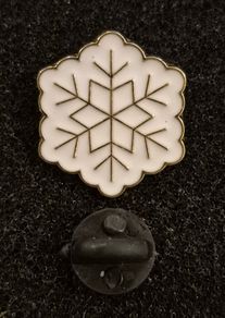 Snowflake,  pin back badge.