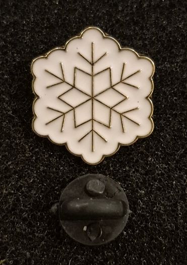 Snowflake,  pin back badge.