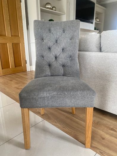 Solid oak dining table and chairs