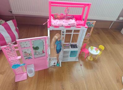 Barbie and portable house