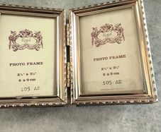 Vintage double photo frame Regal gold-colored 6 x 9 cm.