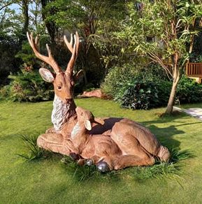 Antlered deer statue - resin