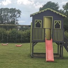 Playhouse with slide and swings