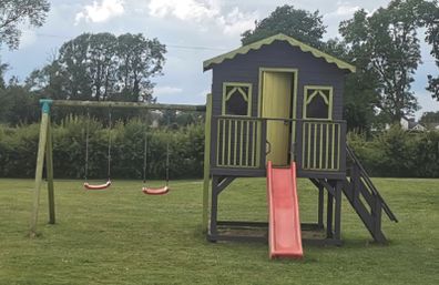 Playhouse with slide and swings