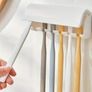 Automatic Toothpaste Dispenser and Toothbrush Holder Image 5