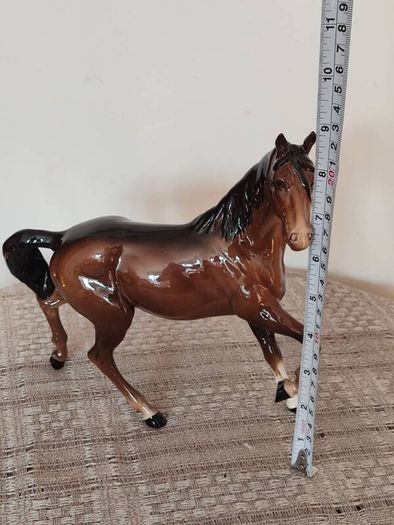 Vintage Royal Doultot porcelain horse. new in the box.