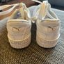 Unisex UK 12 white Puma trainers Image 4
