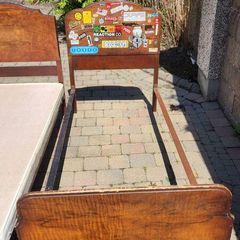 Single bed on iron frame