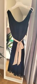 Black pleated dress with contrast belt