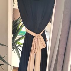 Black pleated dress with contrast belt